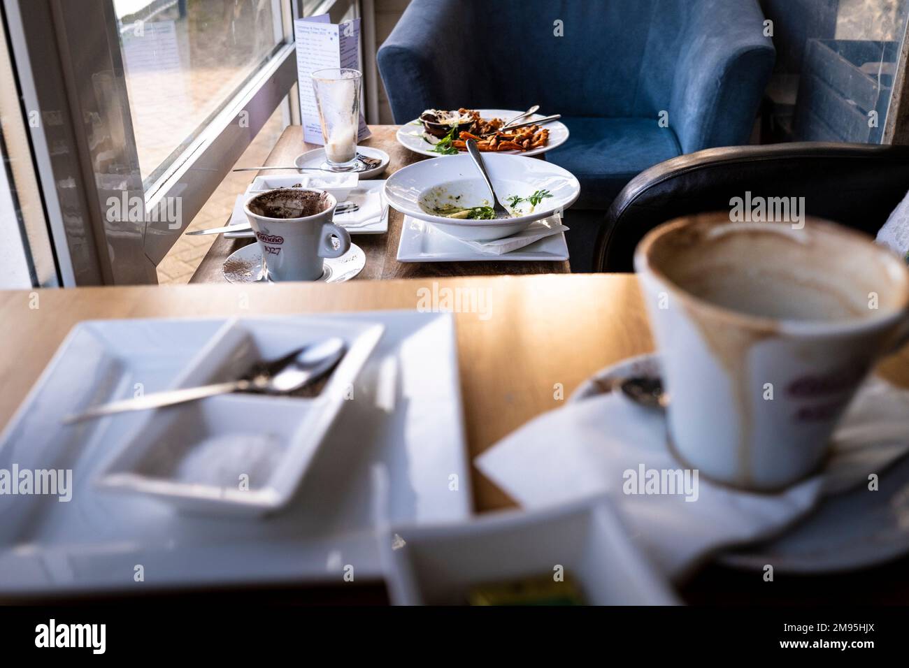 The remains of a meal on a table in a restaurant. Stock Photo