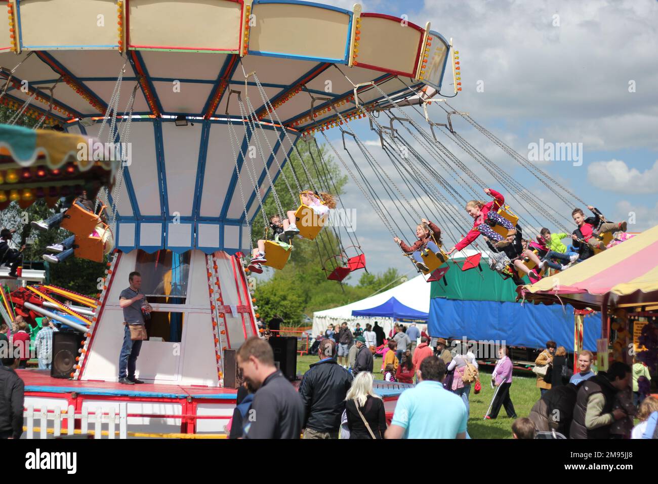 Merry go round or roundabout at a fair Stock Photo Alamy