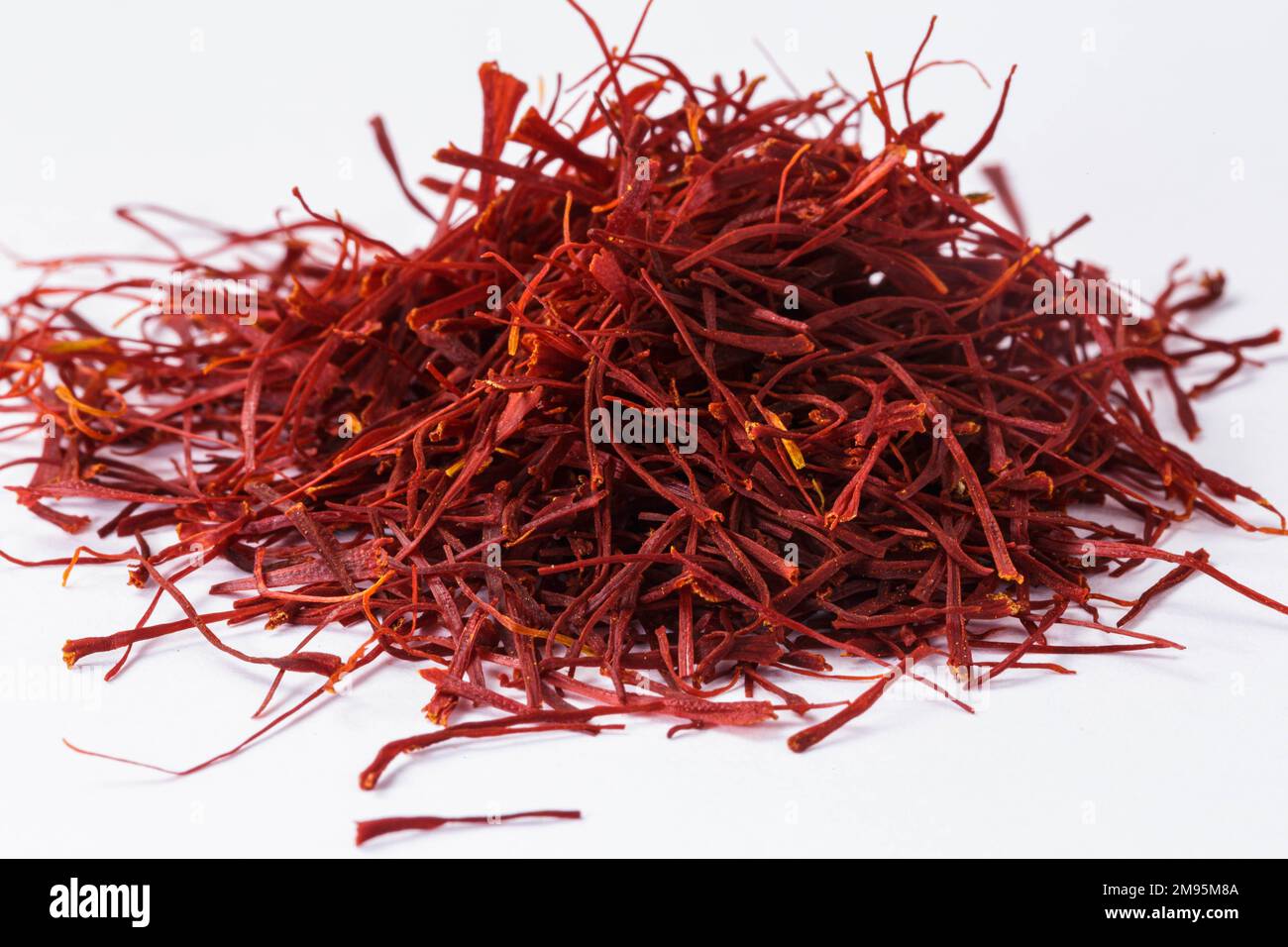 The Flavor of Royalty Stunning Saffron on White Background Stock Photo