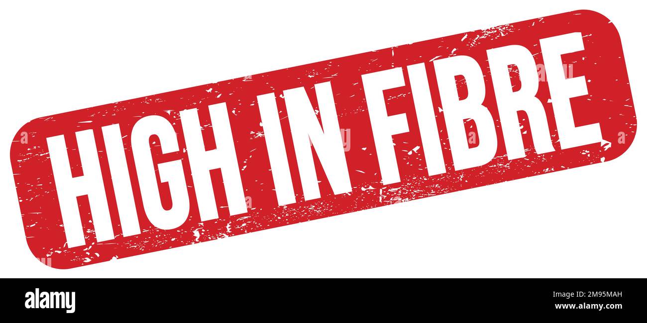 HIGH IN FIBRE text written on red grungy stamp sign. Stock Photo