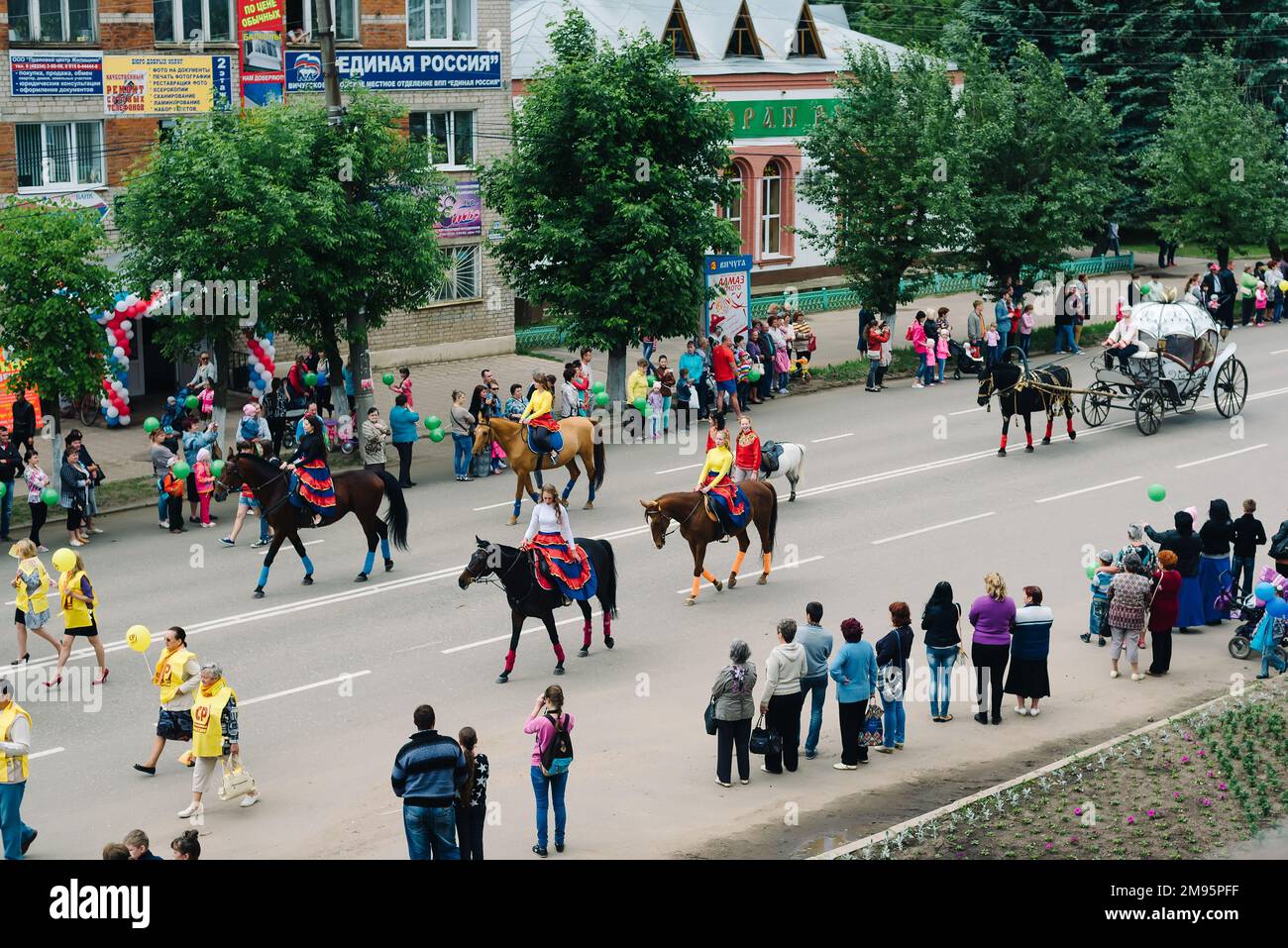 VICHUGA, RUSSIA - JUNE 6, 2015: The celebration of the City of Vichuga in Russia. A crowd of people walking down the street Stock Photo