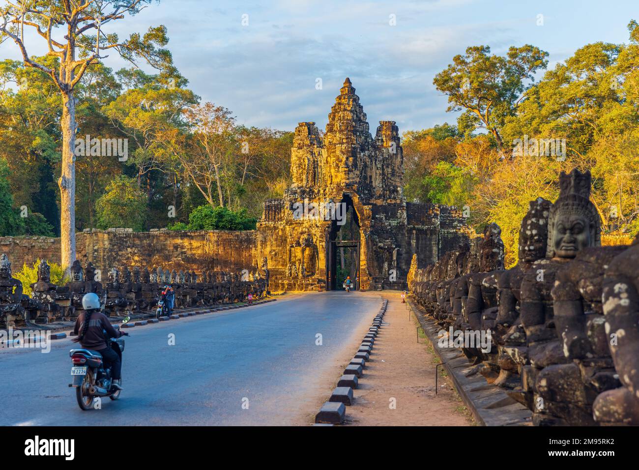 SIEM REAP, JANUARY 11, 2023: Beautiful sunset light on the South Gate leading to Angkor Thom, Cambodia Stock Photo