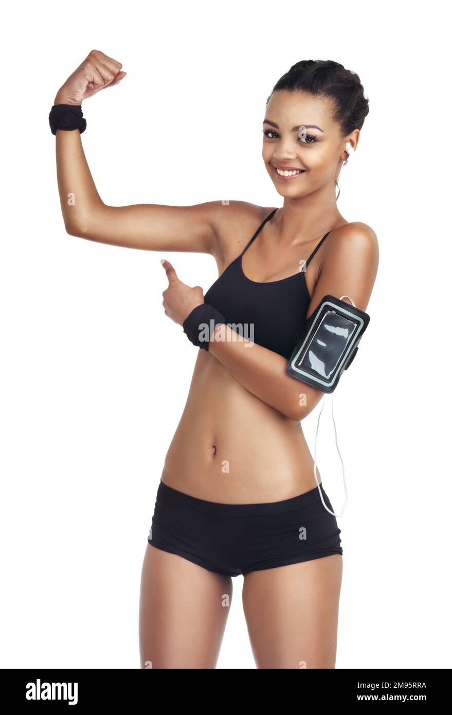 Portrait, strong arm and black woman point at bodybuilder training, fitness workout and health exercise results. Girl listening to music, radio Stock Photo
