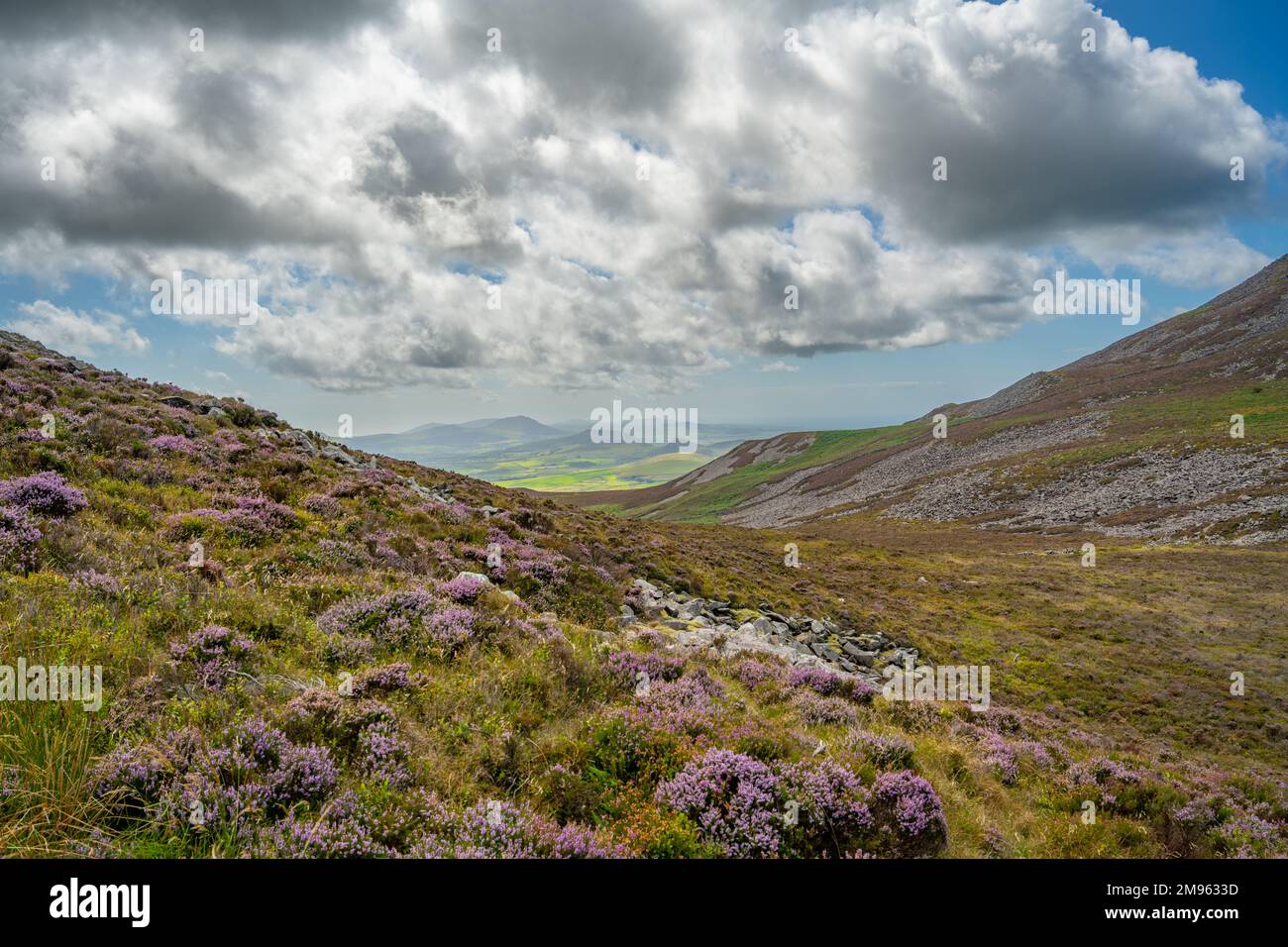 The valley between  the Iron Age hill fort of Tre'r Ceiri and Yr Eifl on the Llyn Peninsula Gwynedd North Wales Stock Photo