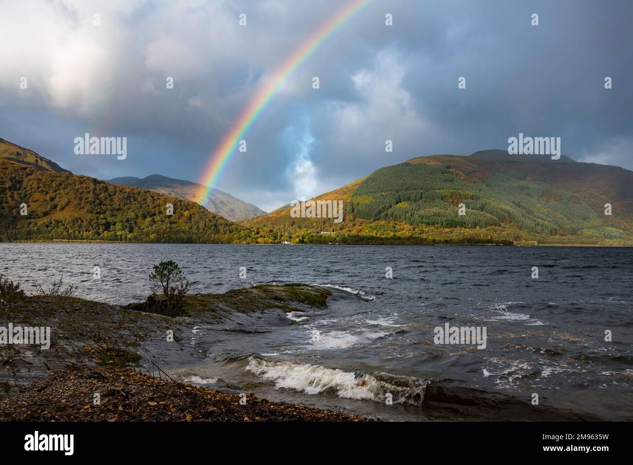 Rainbow over Loch Lomond near Rowardennan, Loch Lomond and Trossachs National Park, Scotland Stock Photo