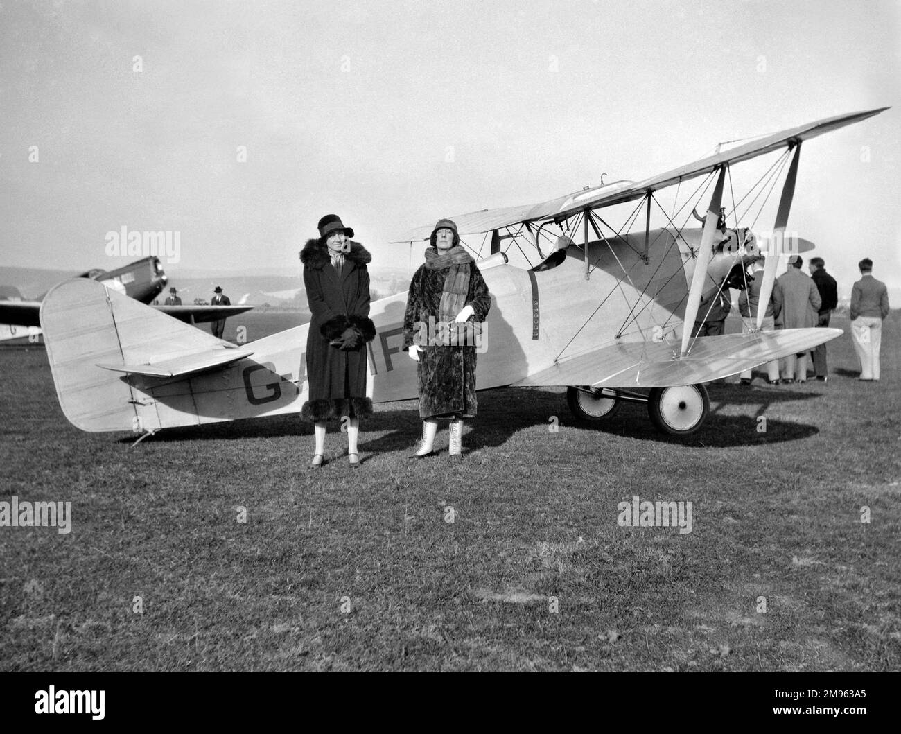 Scene at Shoreham Aerodrome, as  Mrs Maxine Freeman-Thomas (who later became Mrs F.G. Miles) poses in front of her single-seater Southern Martlet aircraft G-ABIF, construction number 205, the fifth production aircraft with an Armstrong Siddeley Genet II engine. Stock Photo