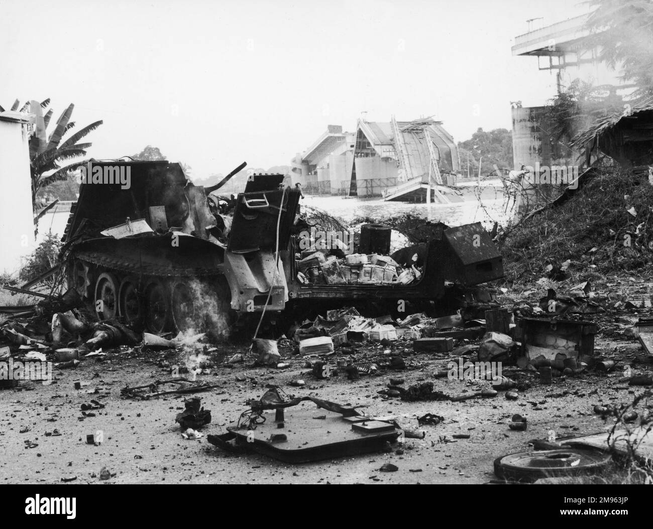 A burnt out tank amidst the ruins and wreckage of further assaults by ...