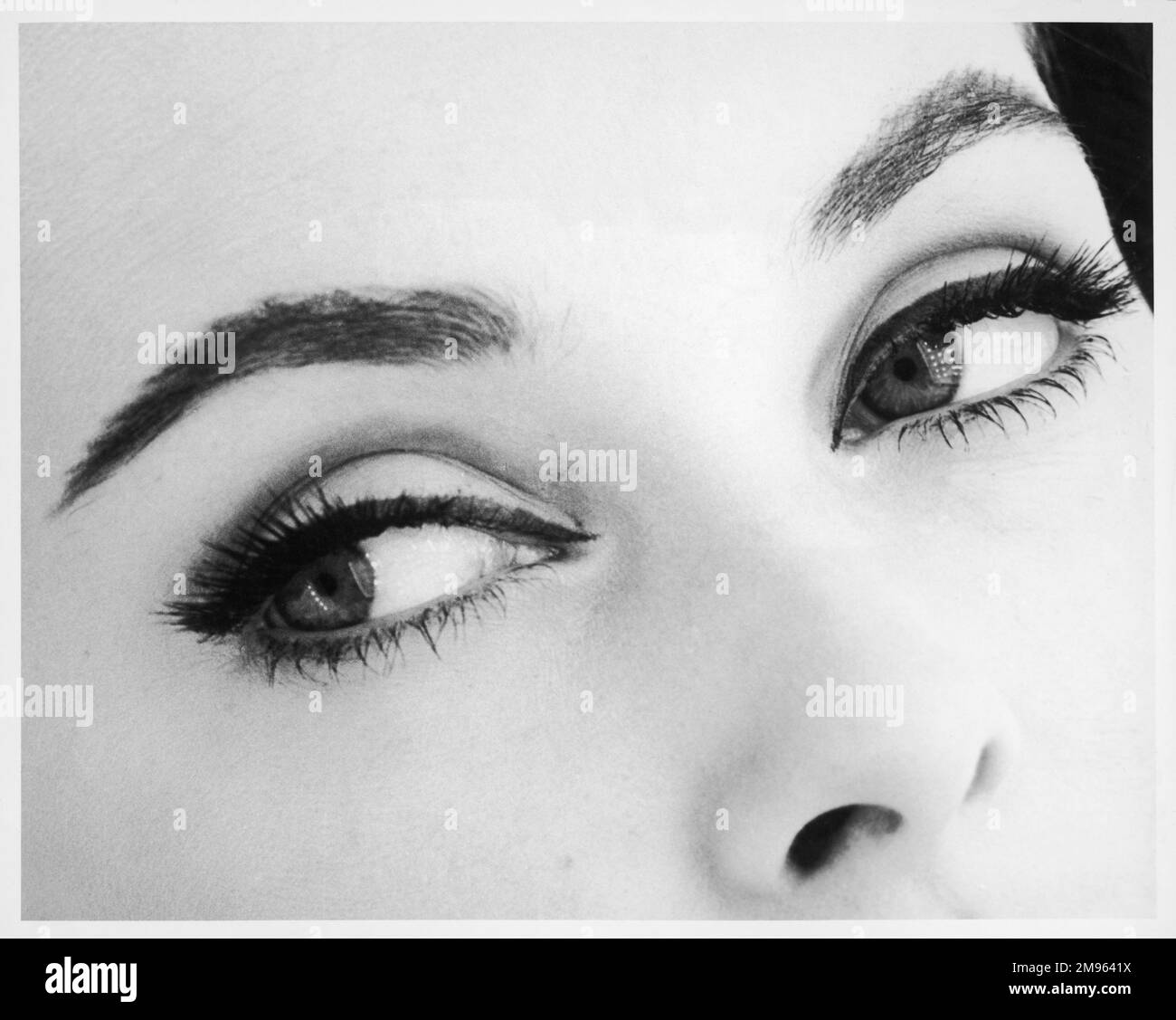A woman's eyes with typical Sixties make-up Stock Photo