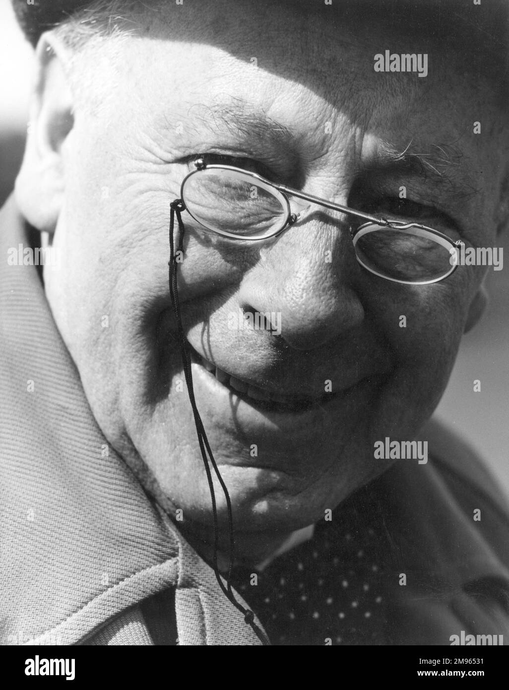 An Old Man In Glasses Stock Photo Alamy colorful-abstract-painting-of-an-old-man-in-deep-thought-on-craiyon