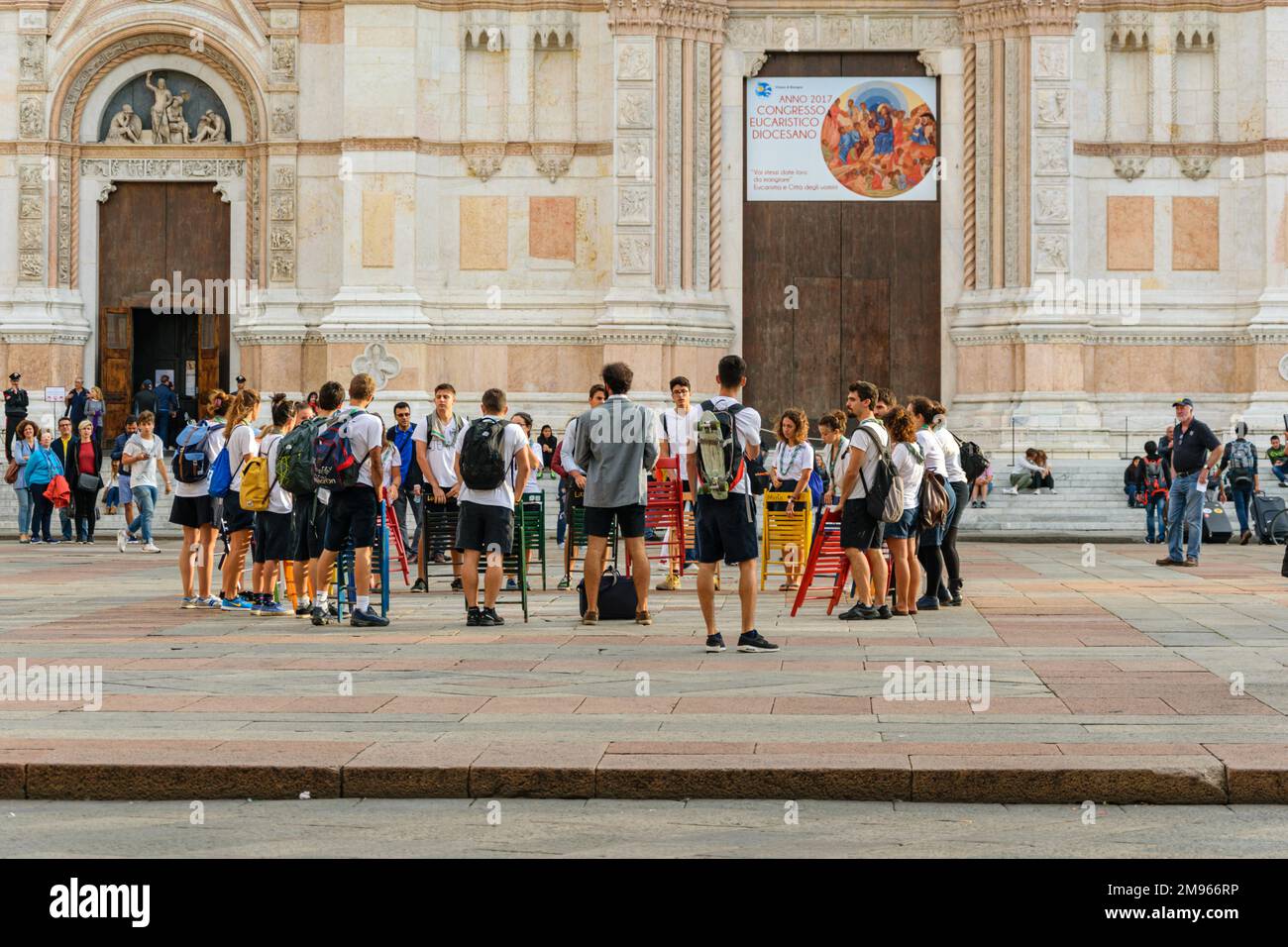 Students in Bologna congregate for a flash mob performance Stock Photo