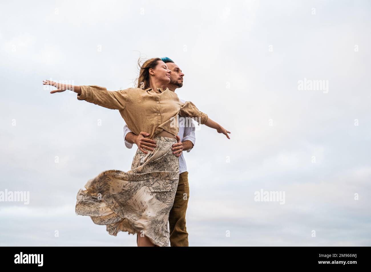 Stand Close Couple stands close eyes hi-res stock photography and images - Alamy