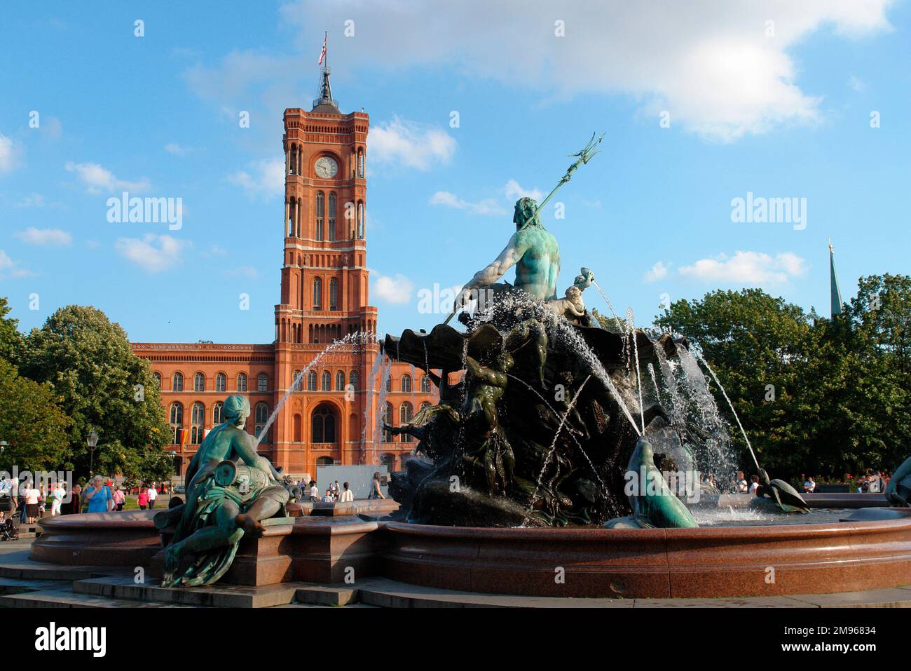 View of the Red Town Hall (Rotes Rathaus) in Berlin, Germany, with the Neptune fountain in the foreground.  It was built between 1861 and 1869 in north Italian high renaissance style.  During the Cold War it was the town hall for East Berlin; from October 1991 it became the official administration centre for unified Berlin. Stock Photo