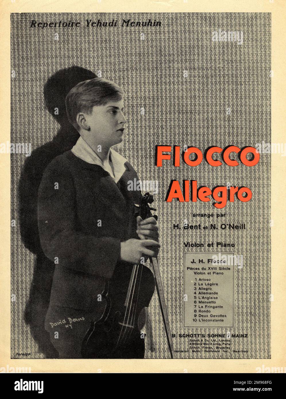 Cover design for a book of ten violin and piano pieces by the 18th century Belgian (Flemish) composer and violinist Joseph-Hector Fiocco (1703-1741), arranged by Arthur Bent and Norman O'Neill, as performed by the young Yehudi Menuhin, whose picture is on the cover, holding his violin and bow.  The pieces are published by Schott & Co (Schott Sohne), and are as follows: Arioso, La Legere, Allegro, Allemande, L'Anglaise, Menuetto, La Fringante, Rondo, Deux Gavottes, and L'Inconstante. Stock Photo