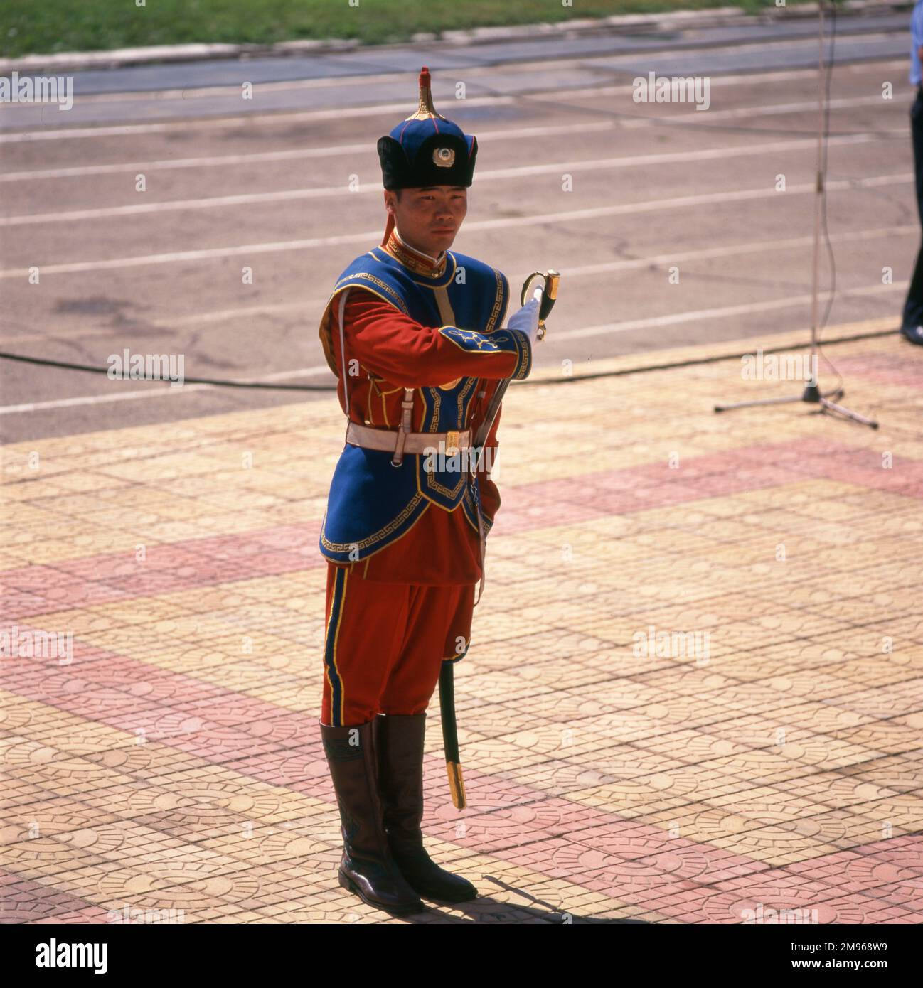 A National Guardsman in uniform during the Naadam Festival in the stadium at Ulaanbaatar (or Ulan Bator), capital of Mongolia.  Typical games played during this competitive festival are wrestling, archery and horse racing. Stock Photo
