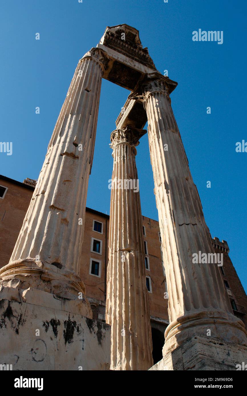 Three Corinthian pillars in the Roman Forum, or Forum Romanum, Rome, Italy. Stock Photo