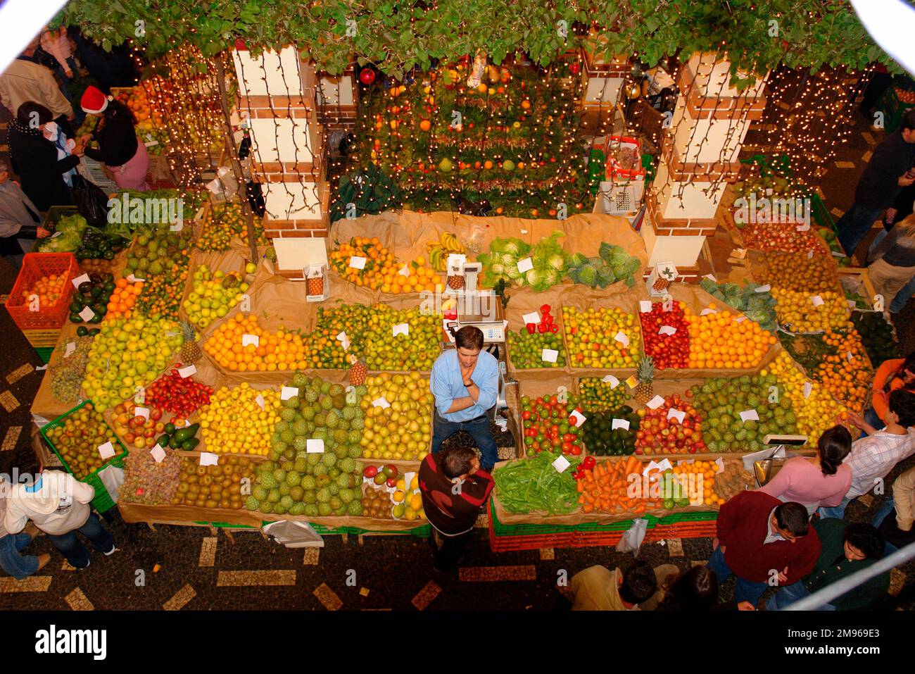 Aerial view of a colourful fruit stall in the local market in funchal