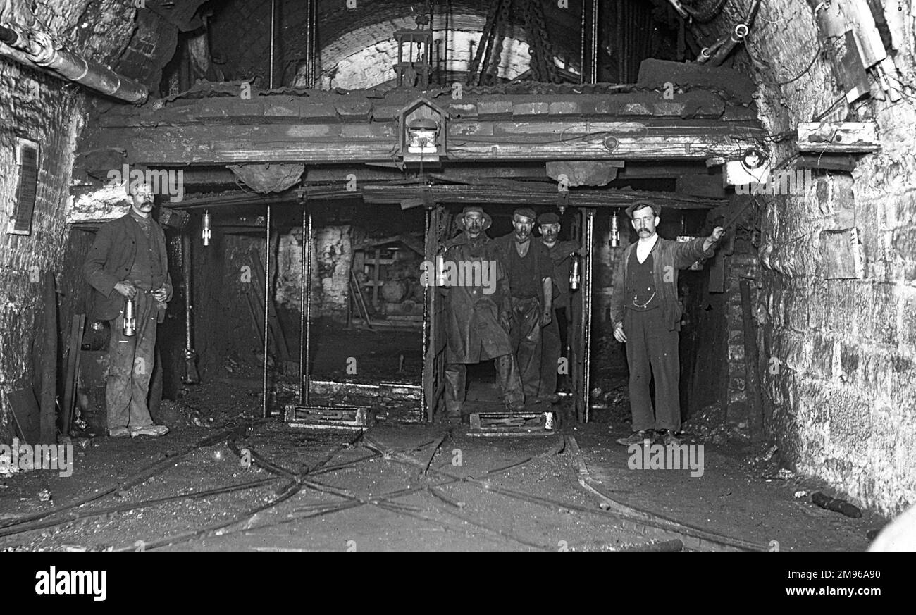 A group of miners at the pit bottom of Tirpentwys Colliery, near Pontypool in South Wales. Stock Photo