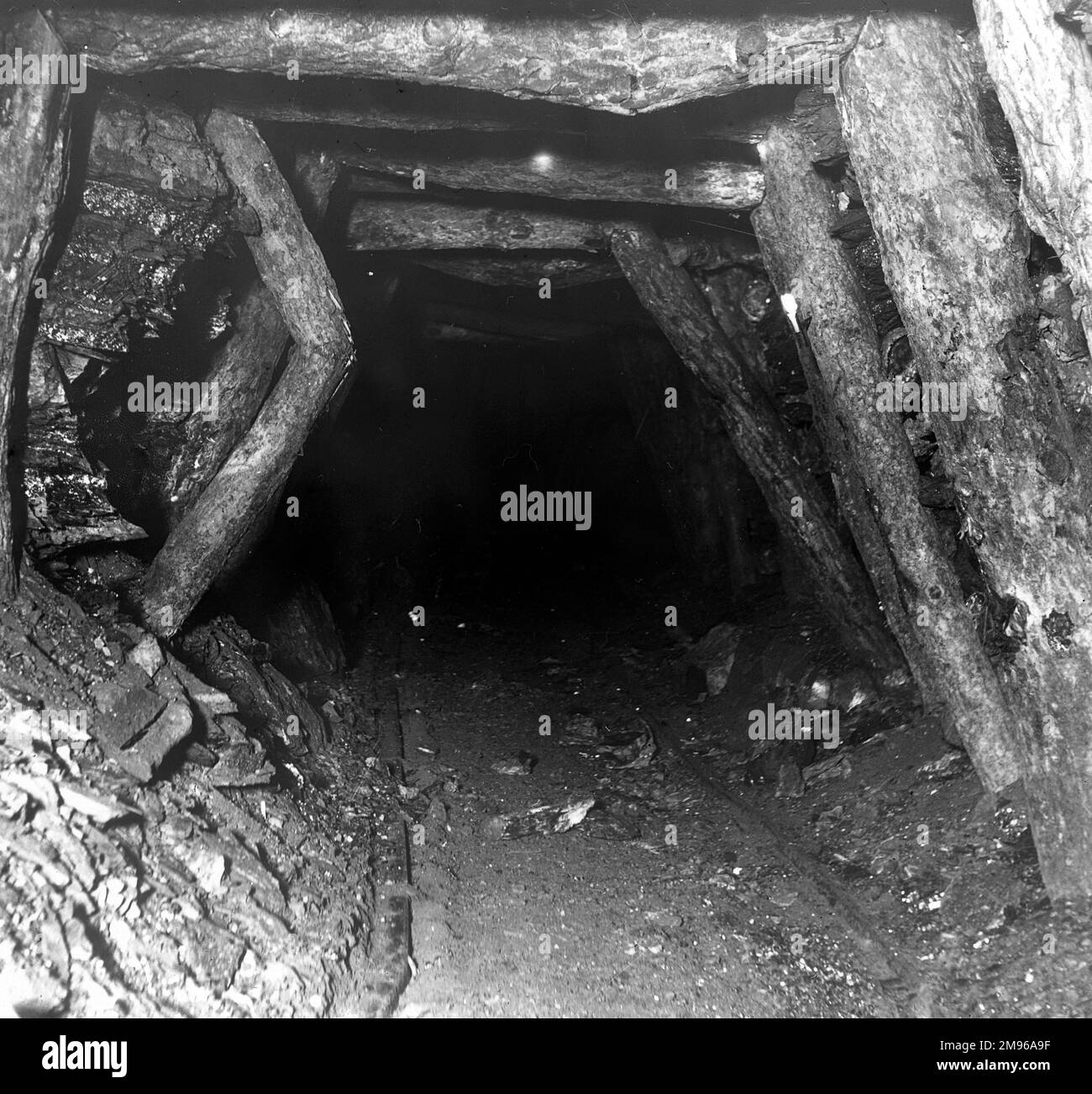 Evidence of side movement, with a broken prop on the left, in a coal