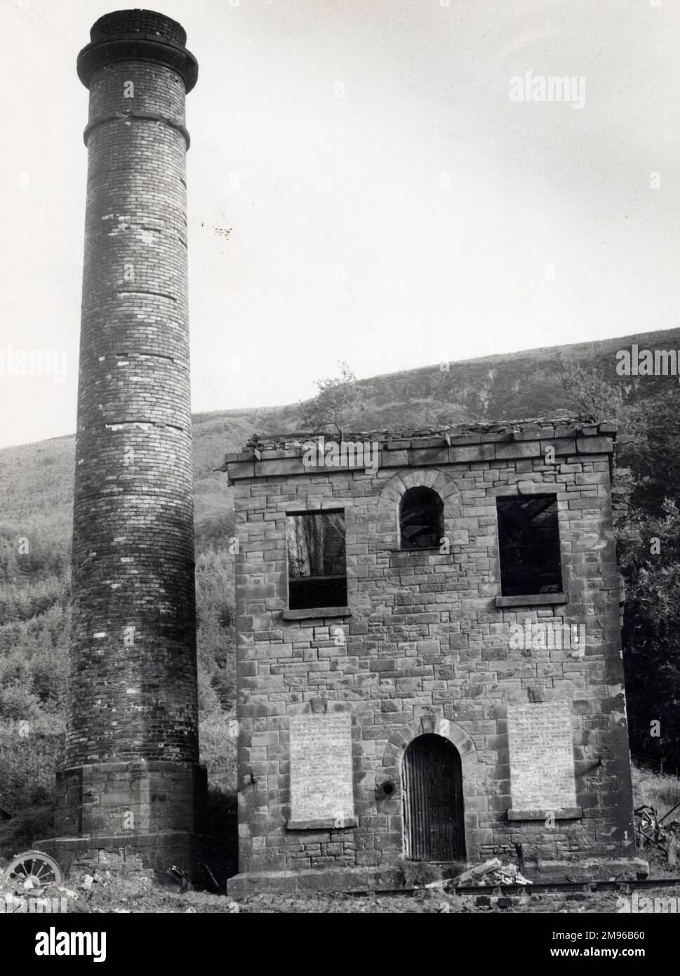 View of the winding engine house, with a tall chimney, at the Glyn Pits