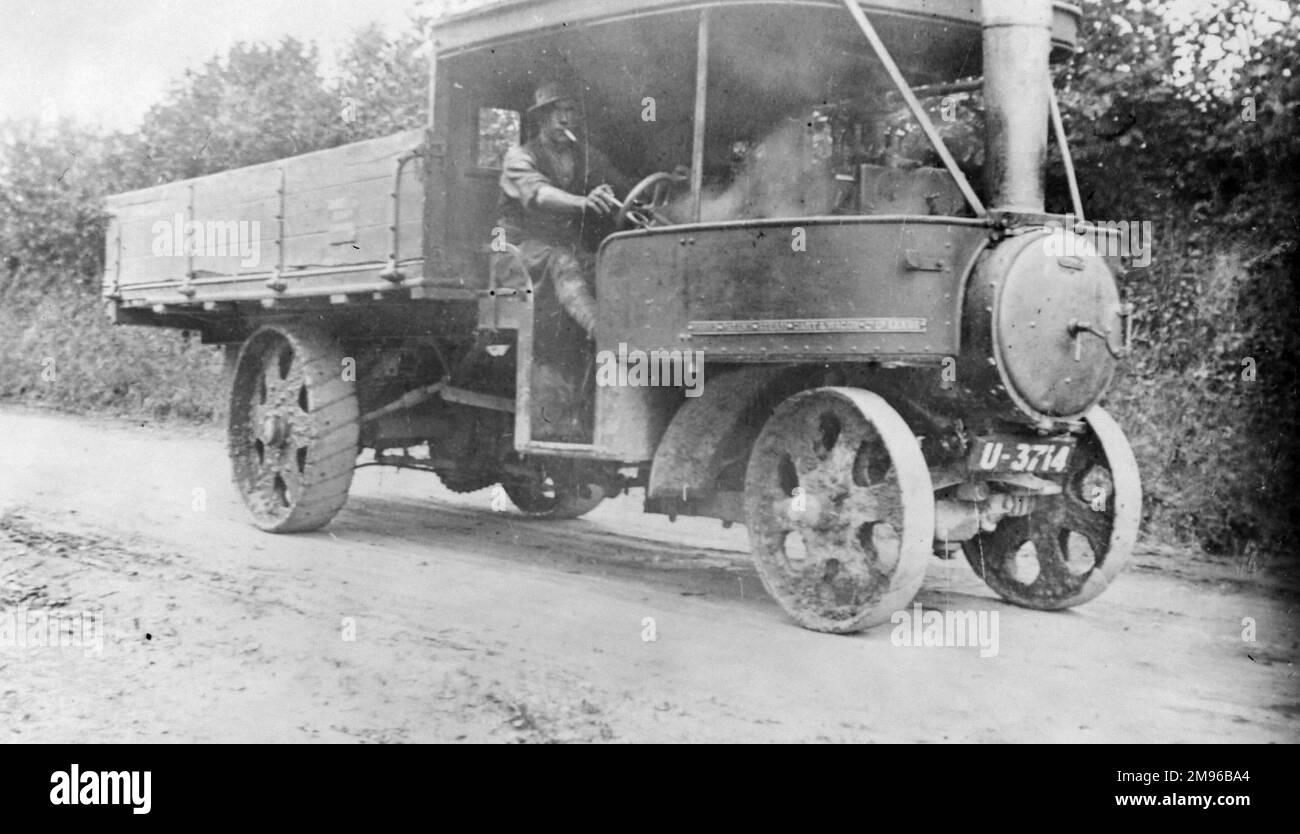 A steam powered vehicle made by the Patent Steam Car and Wagon Company of Leeds, being driven along a road somewhere in South Wales. Stock Photo