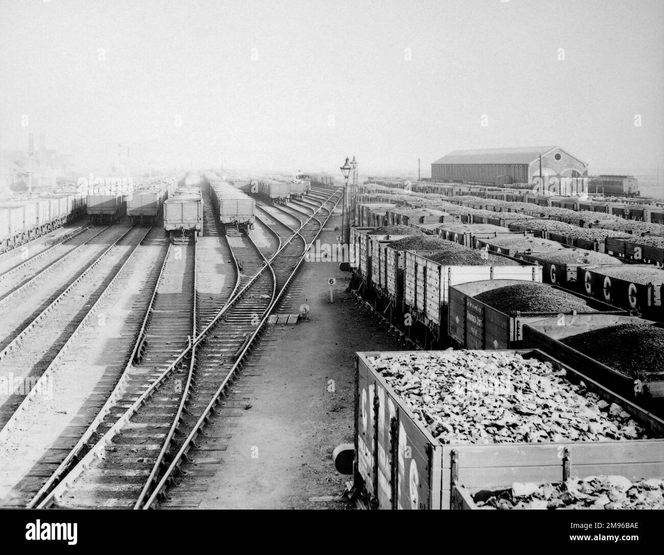 View of Swansea's main railway sidings on the Great Western Railway in Glamorgan, South Wales, with a large number of loaded trucks. Stock Photo