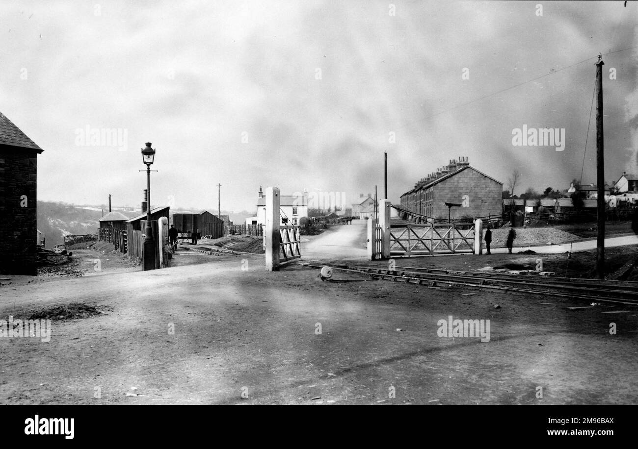 View of the railway crossing at the village of Llangyfelach, Glamorgan, South Wales, on the Great Western Railway. Stock Photo