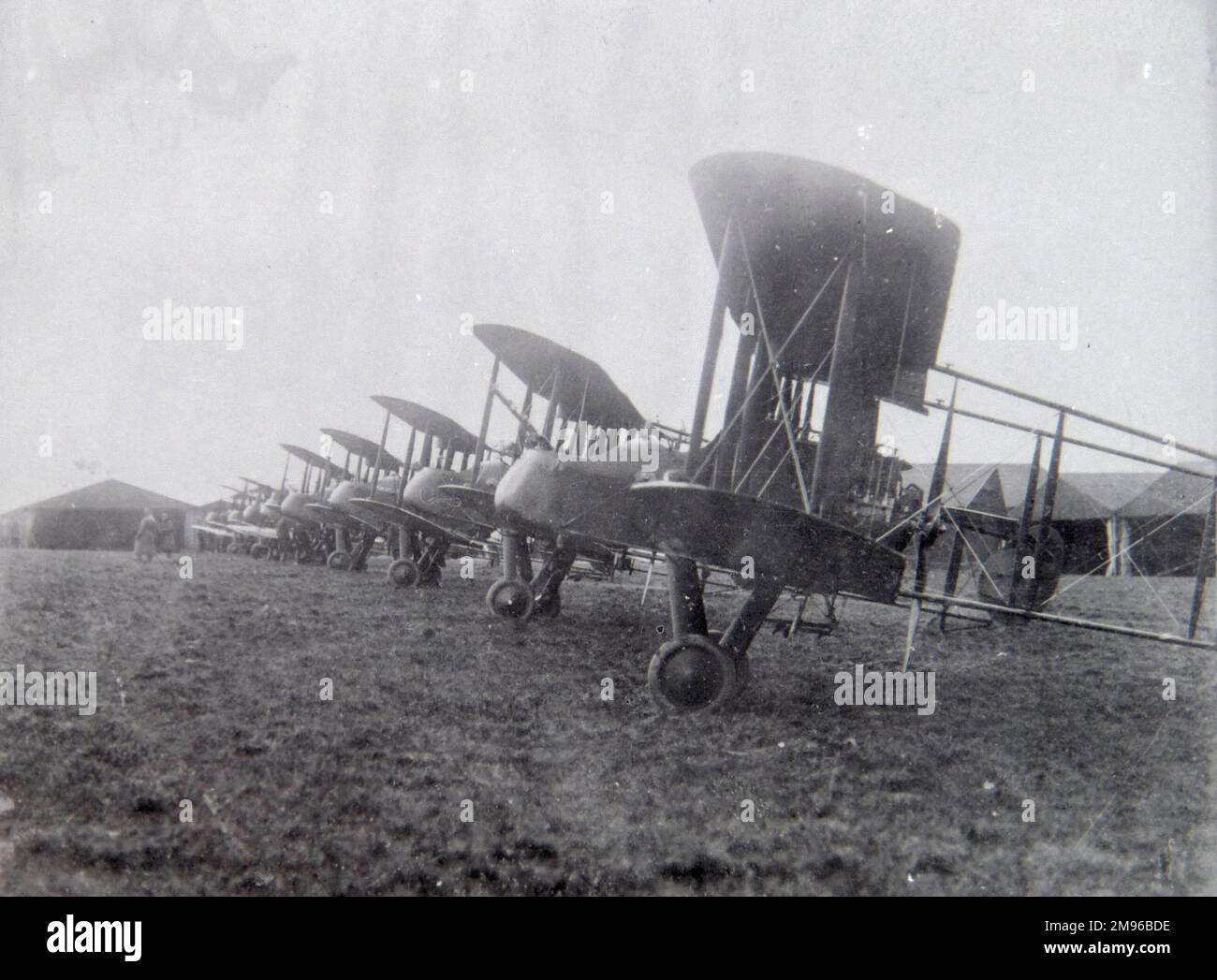 A line of WW1 aircraft in a field after the end of the war (Royal Aircraft Factory F.E.2), awaiting conversion to civilian use. Stock Photo