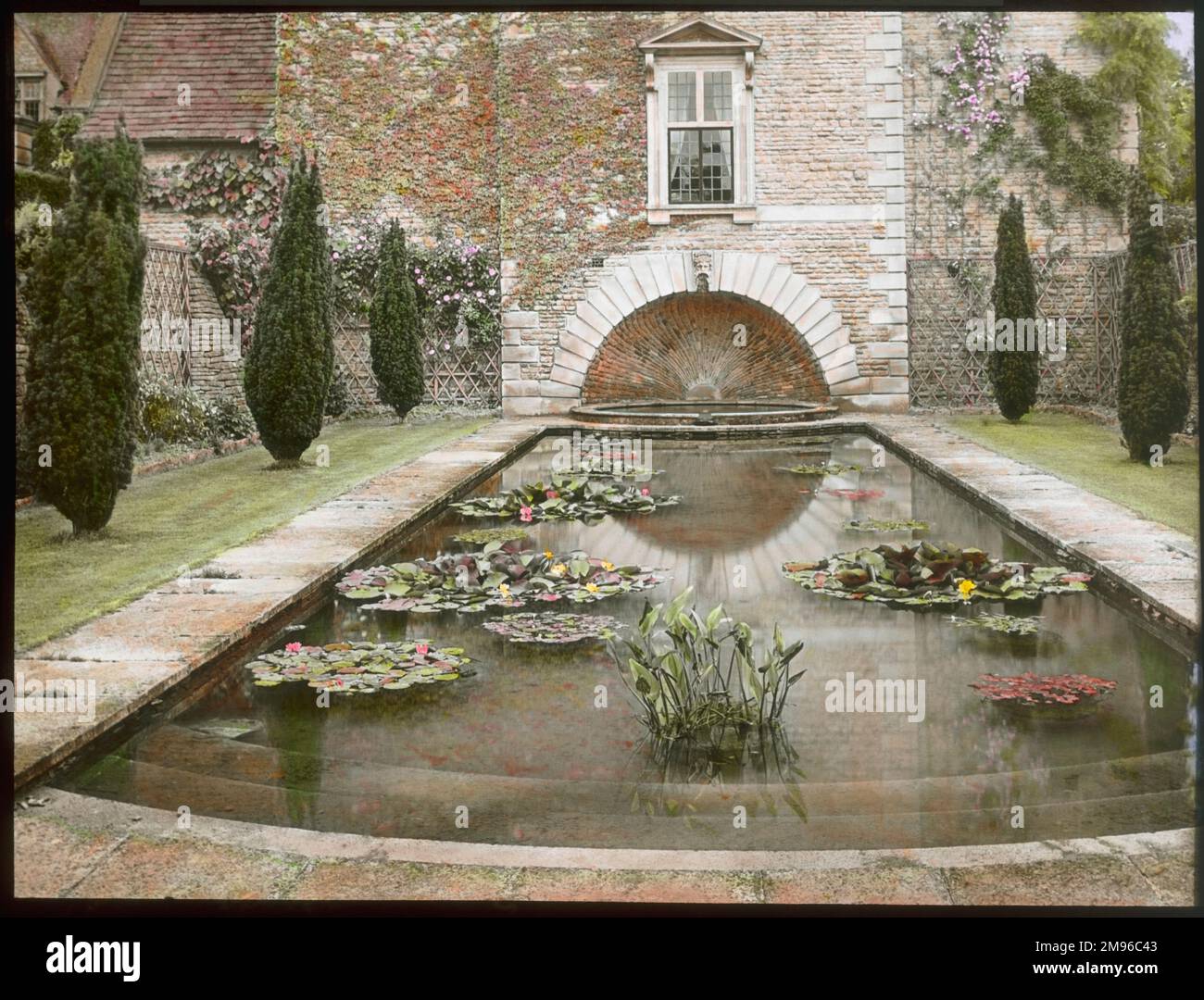 View of a lily pond in the formal gardens at Abbotswood, Stow on the Wold, Gloucestershire.  The gardens were created by Sir Edwin Lutyens. Stock Photo