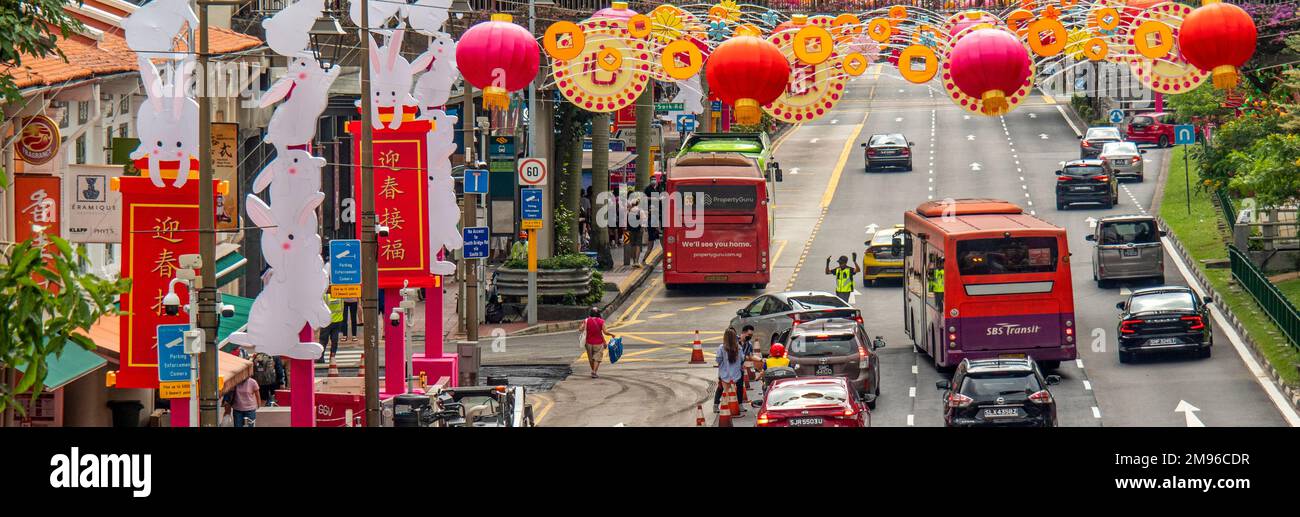 Traffic along New Bridge Road under Chinese New Year decorations for Year of the Rabbit Chinatown Singapore. Stock Photo