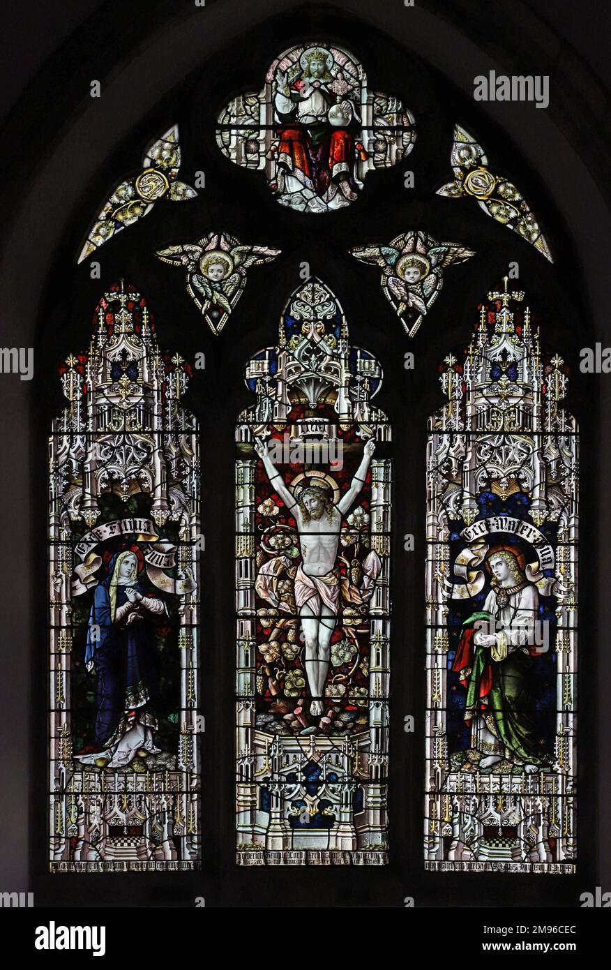 Stained glass window by Percy Bacon & Brothers depicting the crucifixion, Church of St James, Egerton, Kent Stock Photo