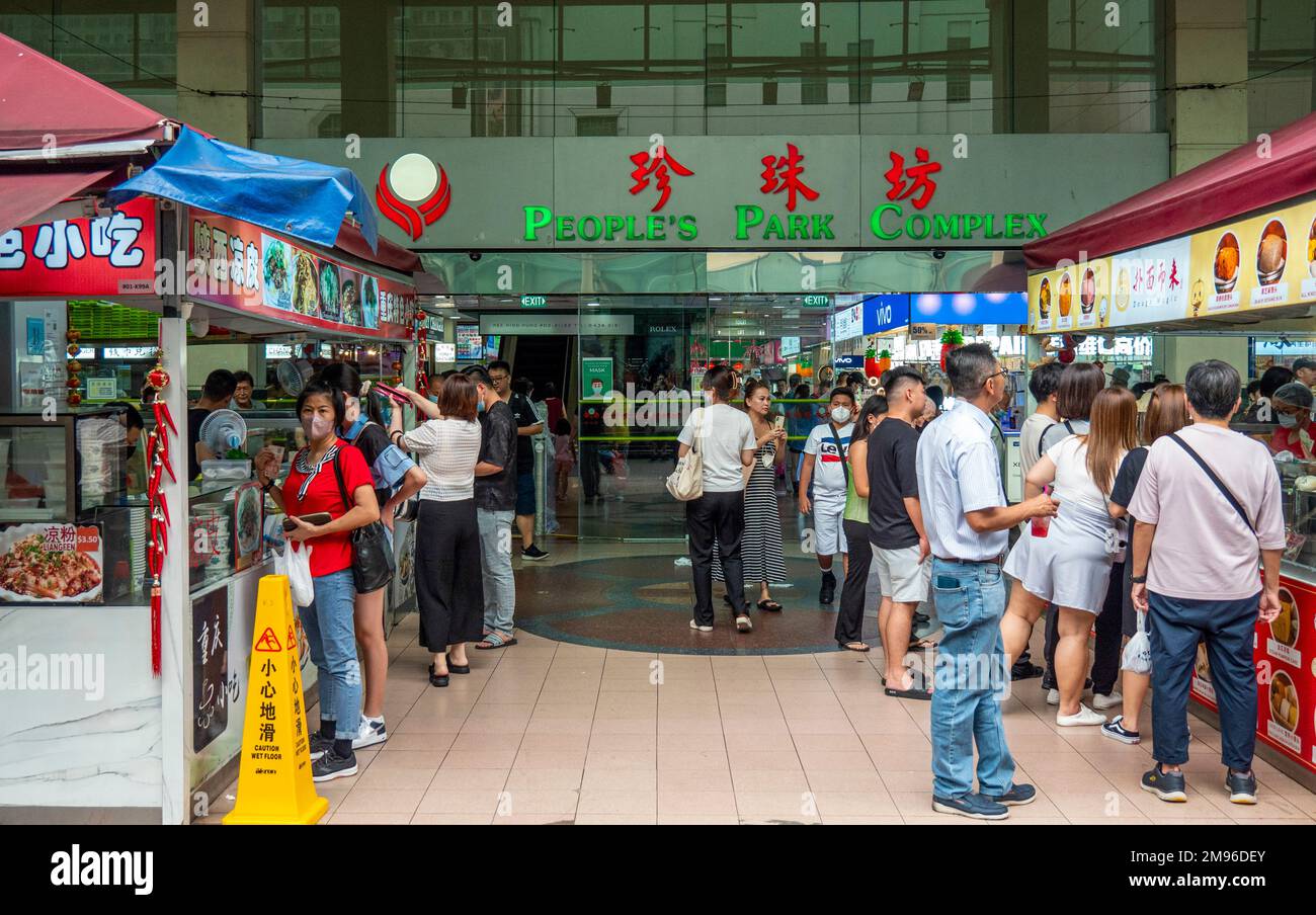 Food stalls at People's Park Complex residential and commercial tower in Chinatown Singapore Stock Photo