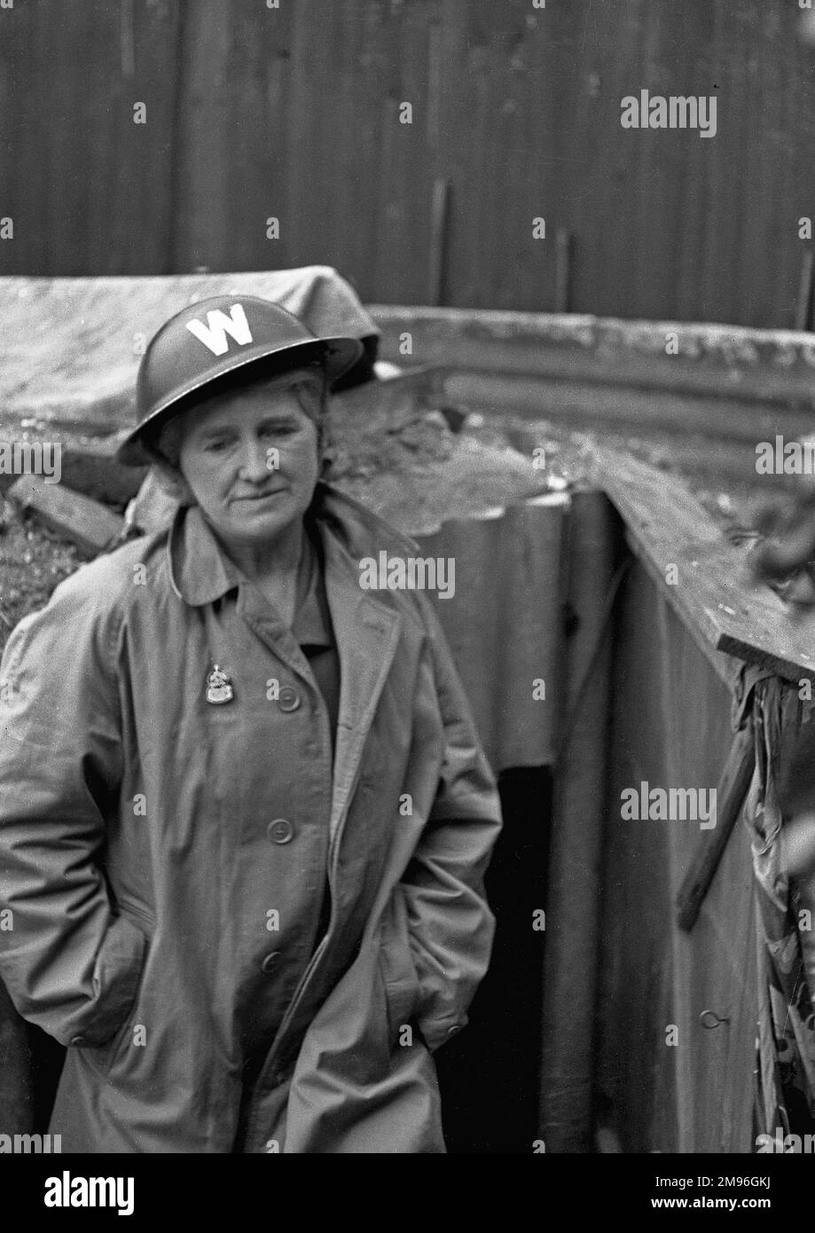 A female air raid warden in her tin helmet during the Second World War