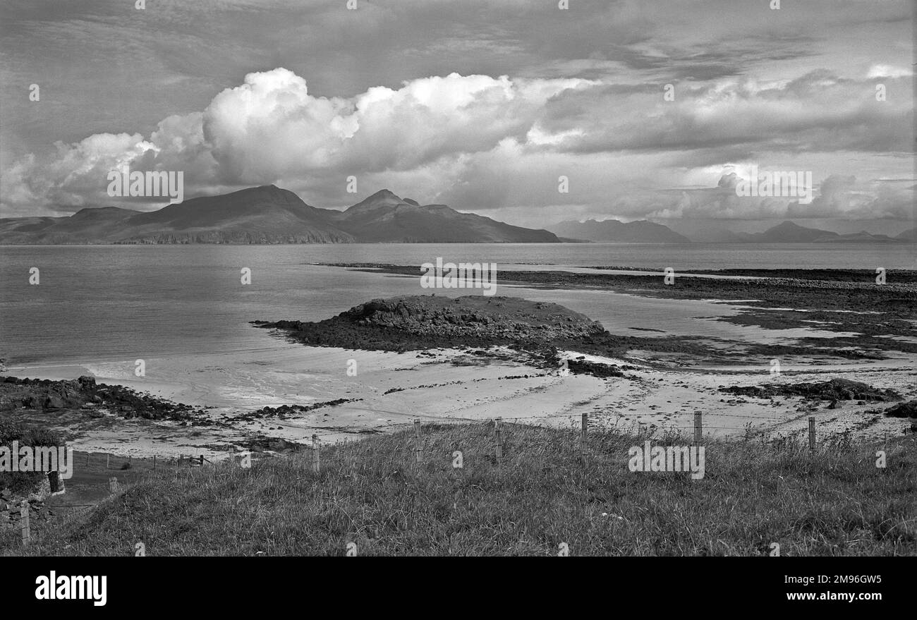 View of the island of Rum from Muck, Inner Hebrides, northern Scotland. Stock Photo
