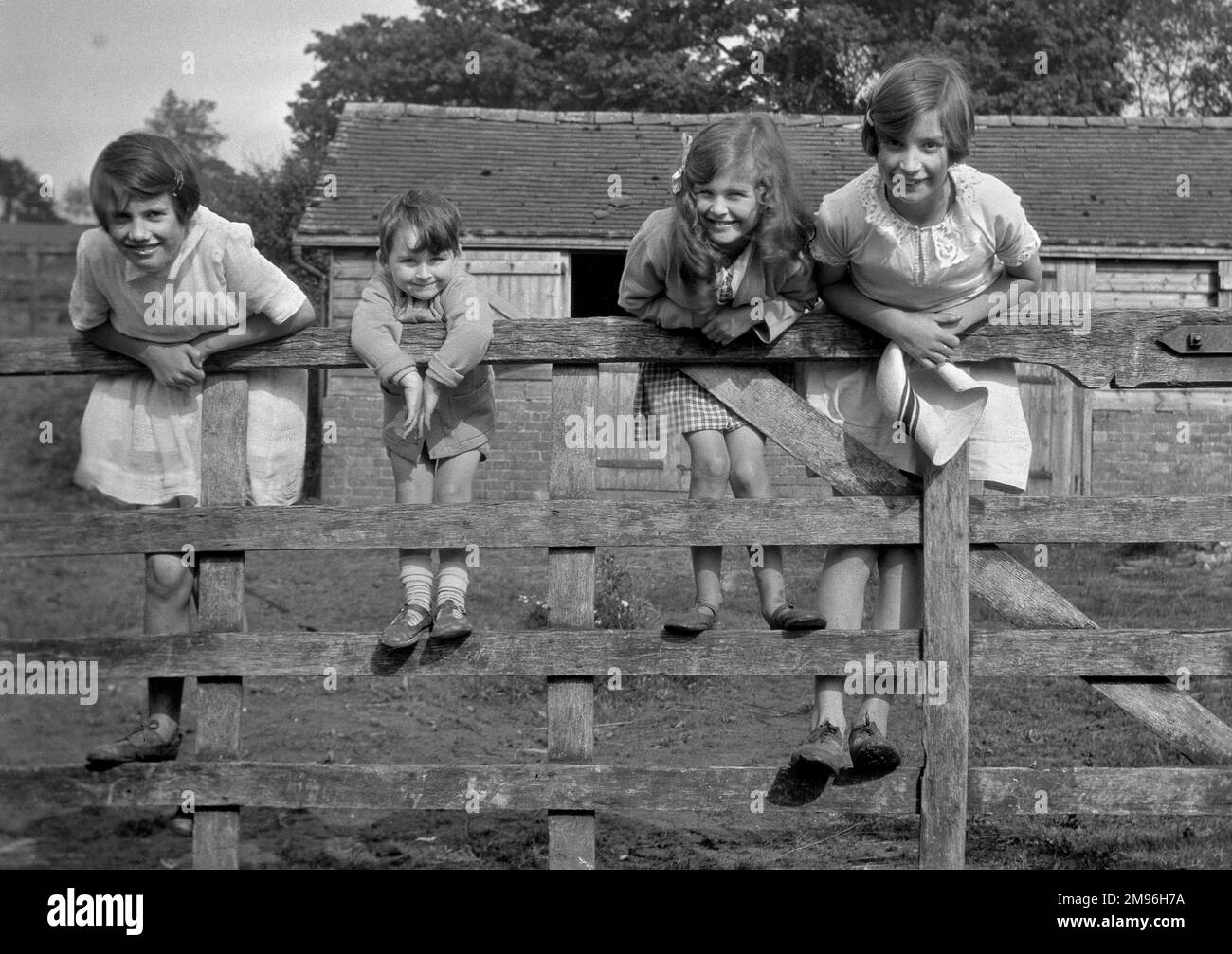 Child on fence Black and White Stock Photos \u0026 Images - Alamy, image size:1300x1007