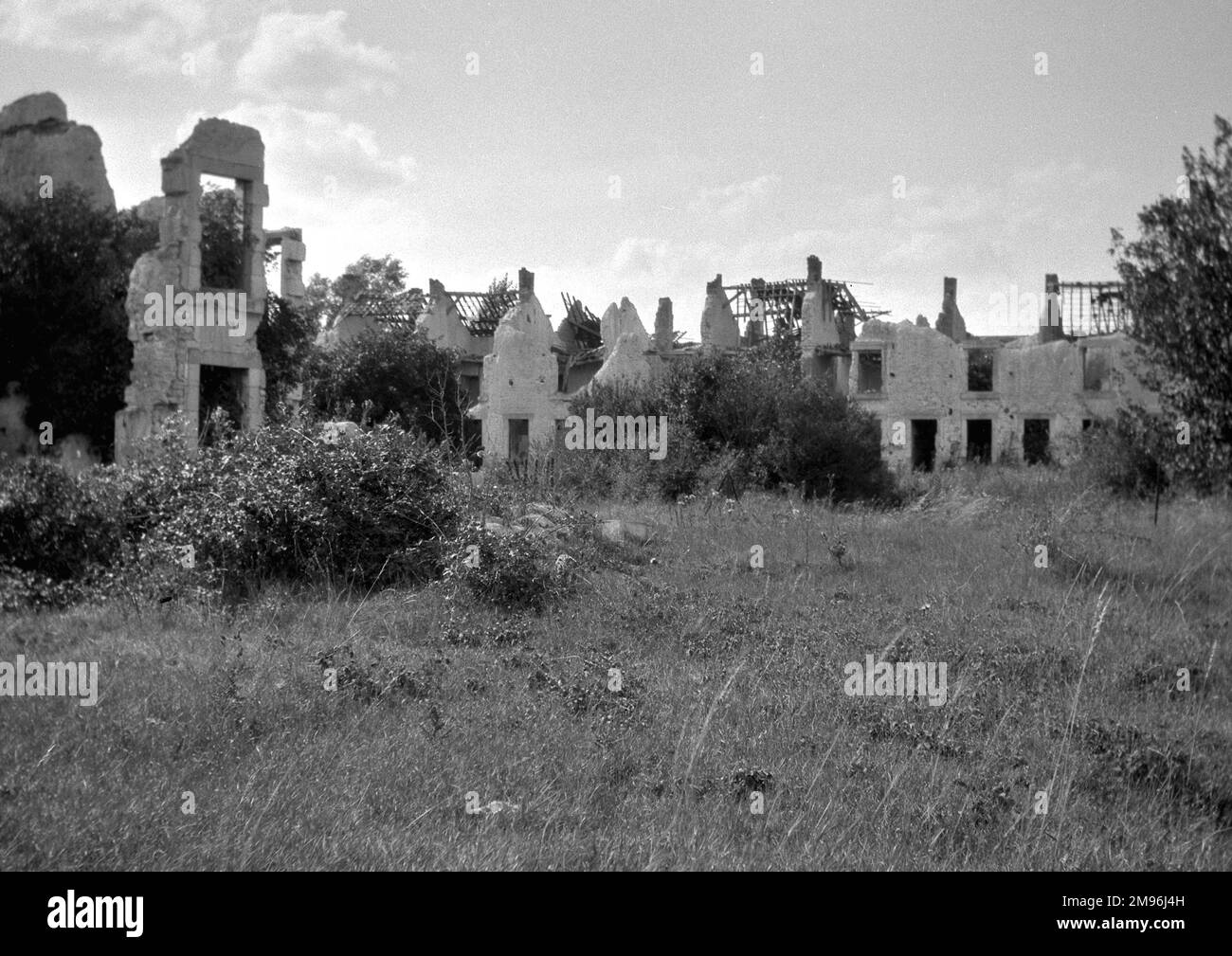 Buildings in an unidentified location (Northern France or Belgium), badly damaged by shelling and fighting during the First World War. Stock Photo