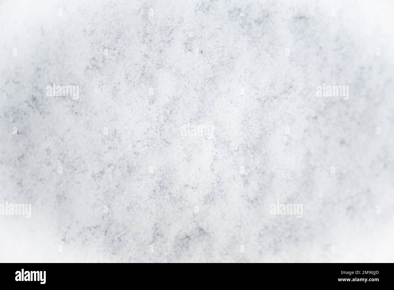 Snow texture top view of snow.White snow texture. Snowflakes.Winter snow.Texture for design.Fresh snowy background.Seamless background of white ice. Stock Photo