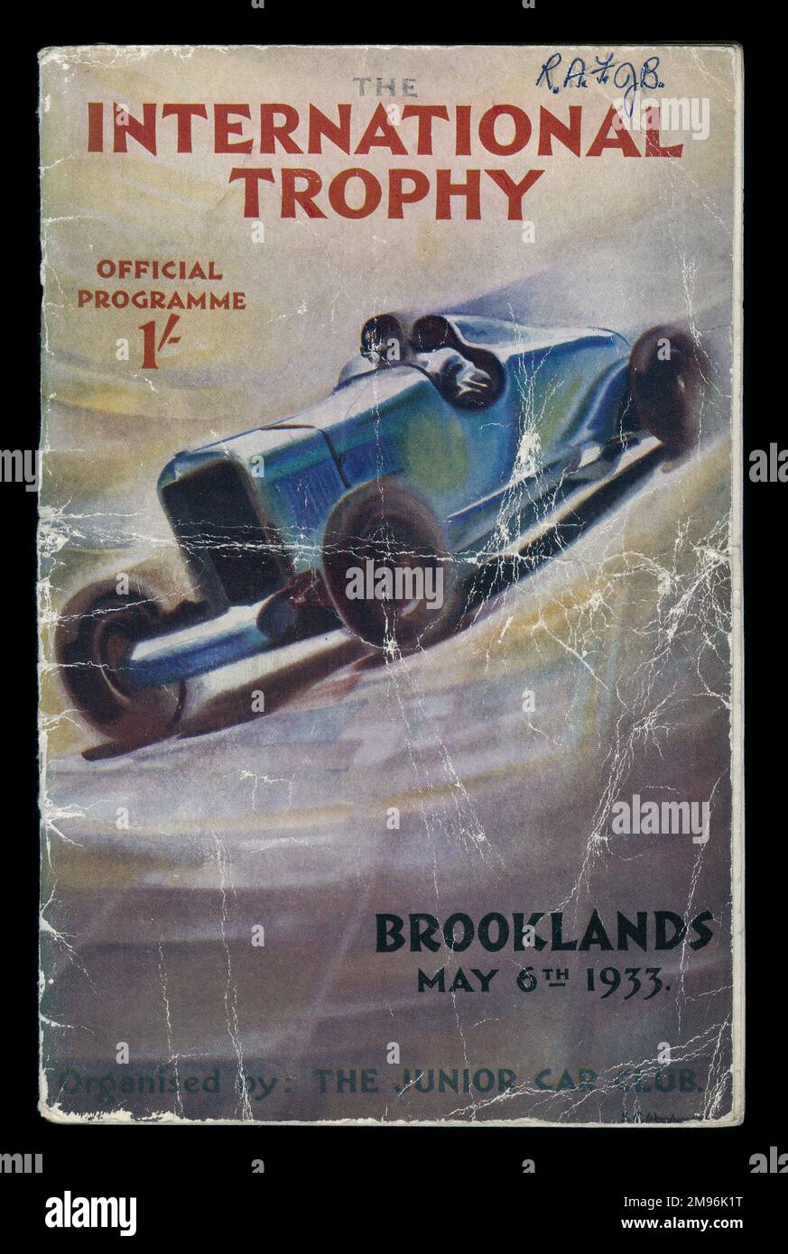 Cover design for the official programme, The International Trophy at Brooklands, organised by the Junior Car Club.  Showing a racing car and driver. Stock Photo