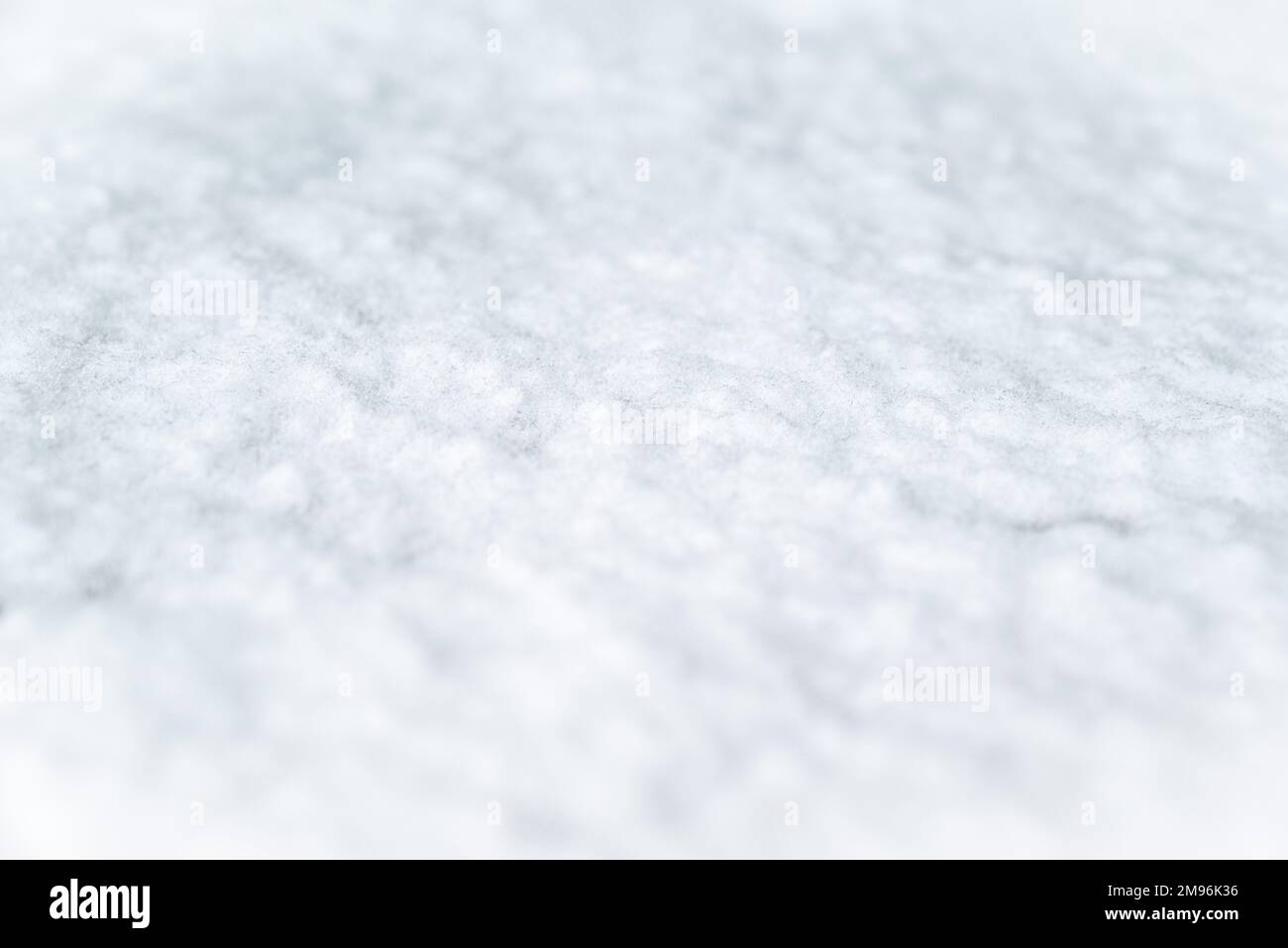 Snow texture top view of snow.White snow texture. Snowflakes.Winter snow.Texture for design.Fresh snowy background.Seamless background of white ice. Stock Photo