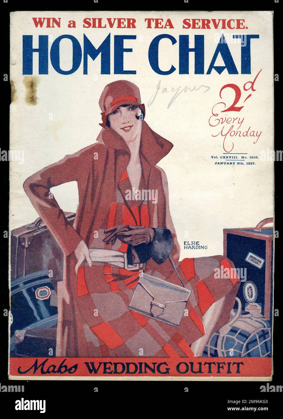 Cover of 'Home Chat' Magazine, with an opportunity to win a silver tea service, showing a smiling young woman in a check dress, light brown coat and matching cloche hat, surrounded with luggage, to illustrate Mabs Wedding Outfit. Stock Photo
