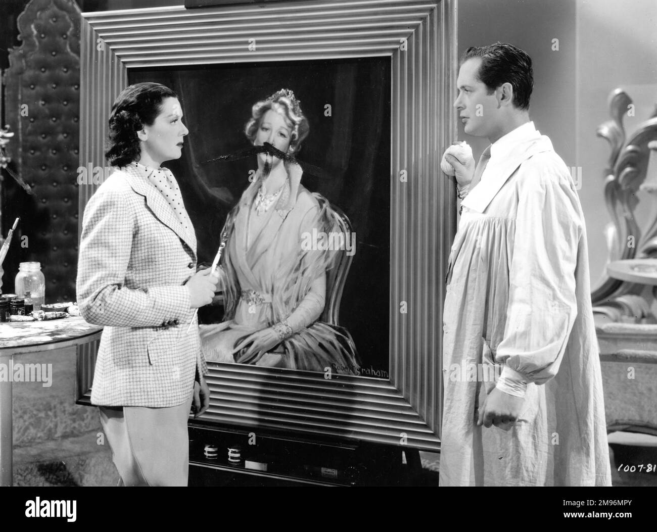 ROSALIND RUSSELL and ROBERT MONTGOMERY in LIVE, LOVE AND LEARN 1937 director GEORGE FITZMAURICE wardrobe Dolly Tree  Metro Goldwyn Mayer (MGM) Stock Photo