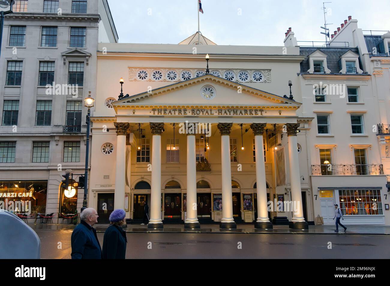 Entrance to the Theatre Royal, Haymarket lit up in the City of Westminster. Stock Photo