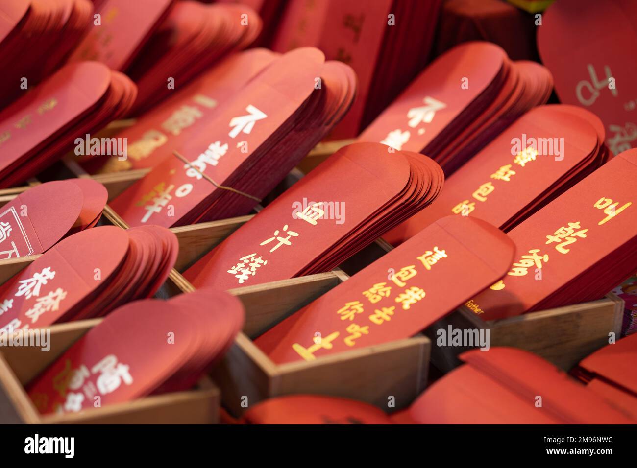 Red envelopes for money gifts are for sale at the Dihua Street New Year's market in Taipei ahead of the Lunar New Year and the Year of the Rabbit. Stock Photo
