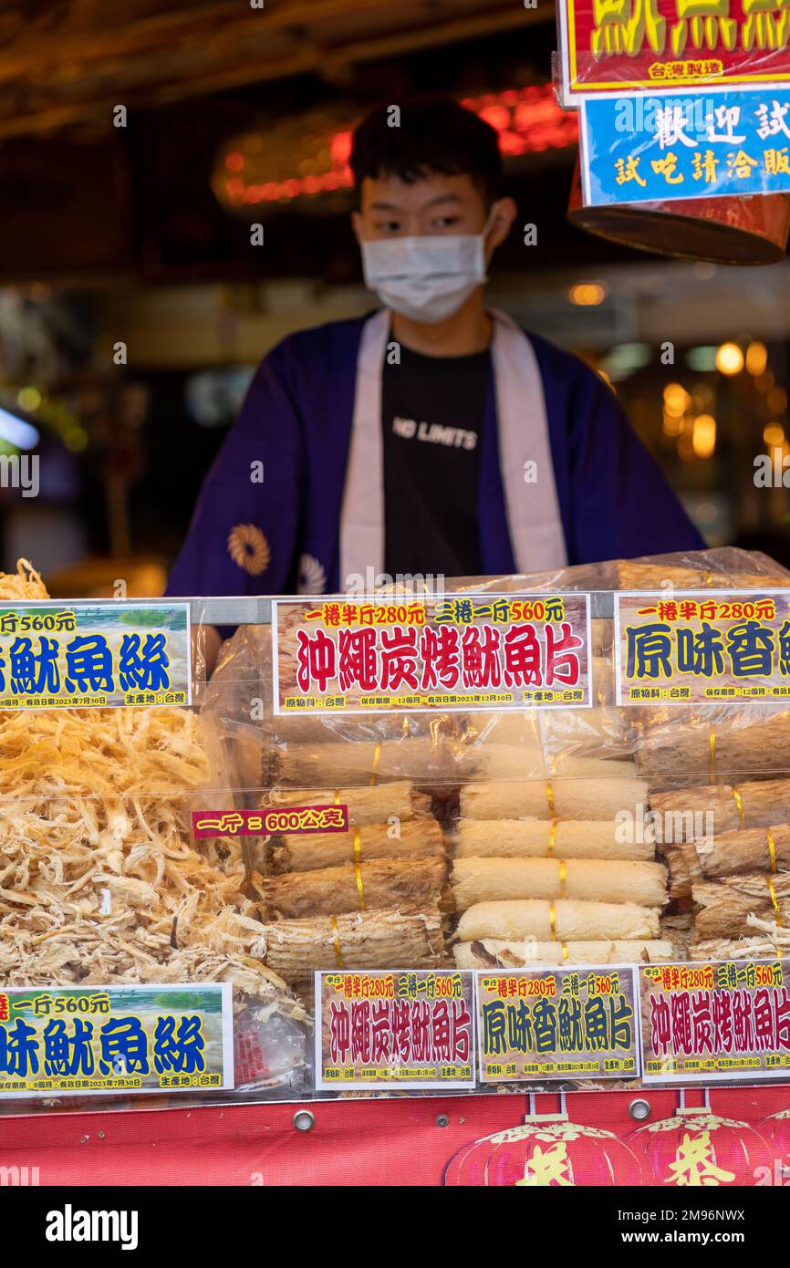 Dried squid prepared in different ways at the Dihua Street New Year's market in Taipei ahead of the Lunar New Year and the Year of the Rabbit. Stock Photo
