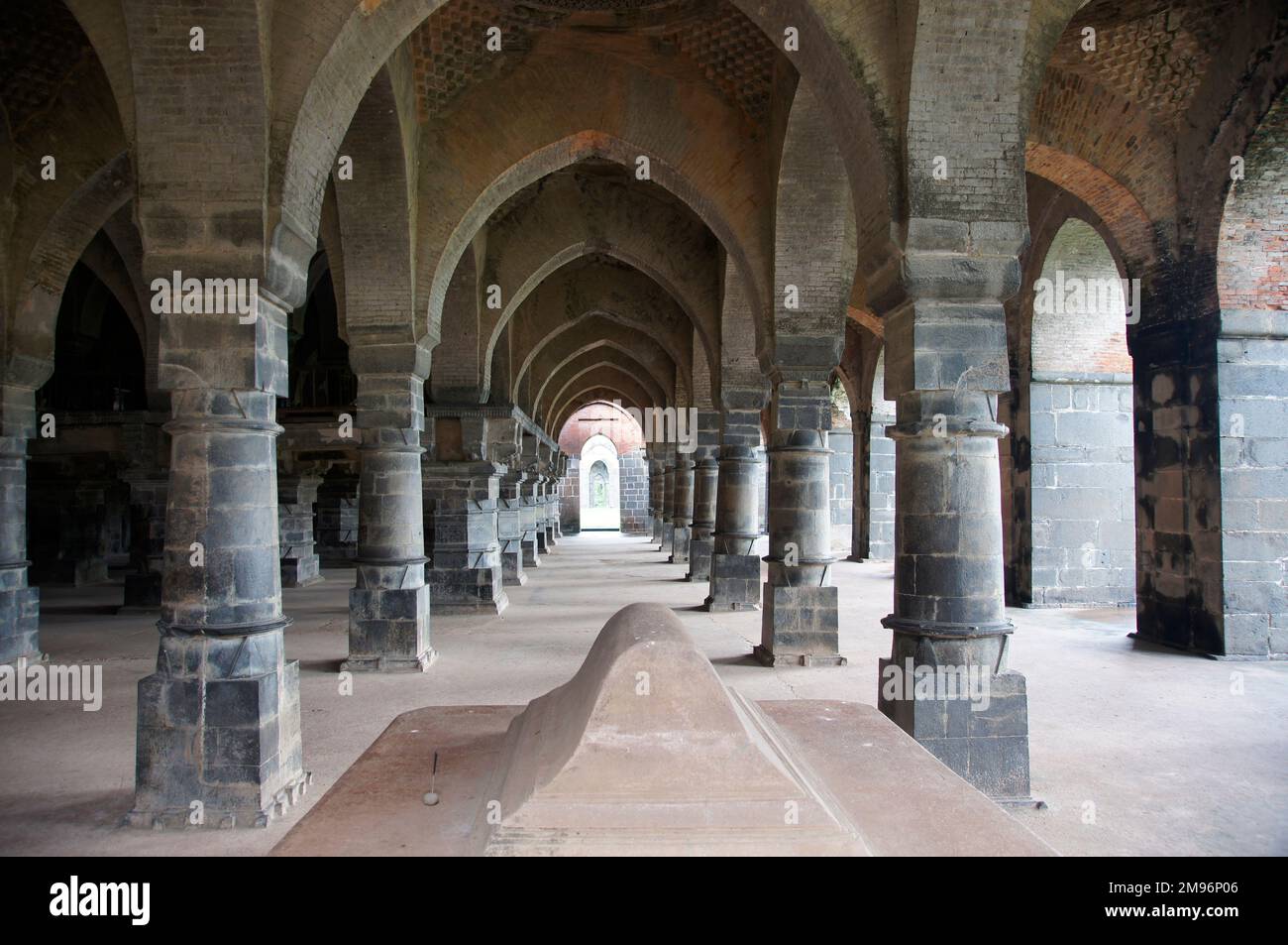 India, West Bengal, Pandua: Adina Mosque or Jami Masjid (1364 AD), innerior, arched nave, tomb. Stock Photo