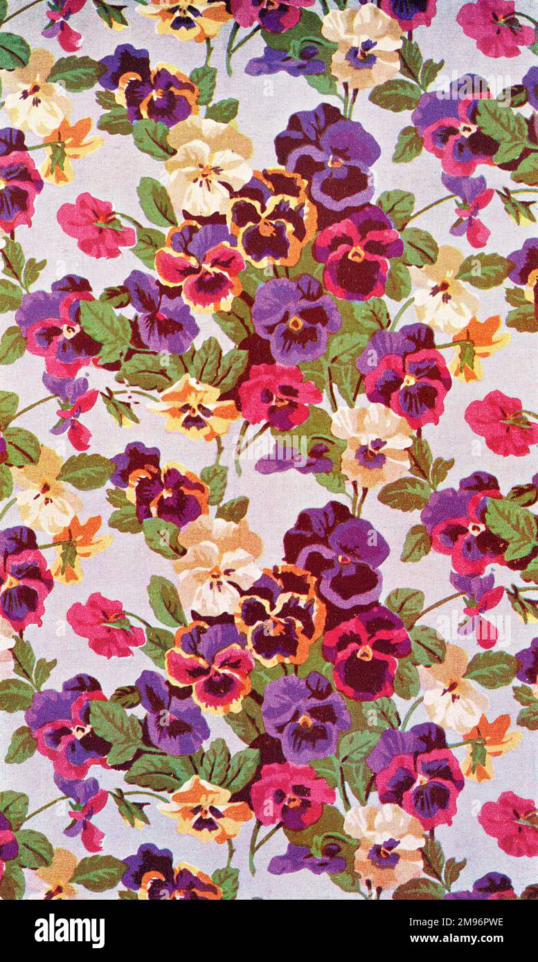 Printed linen design depicting brightly coloured pansies Stock Photo