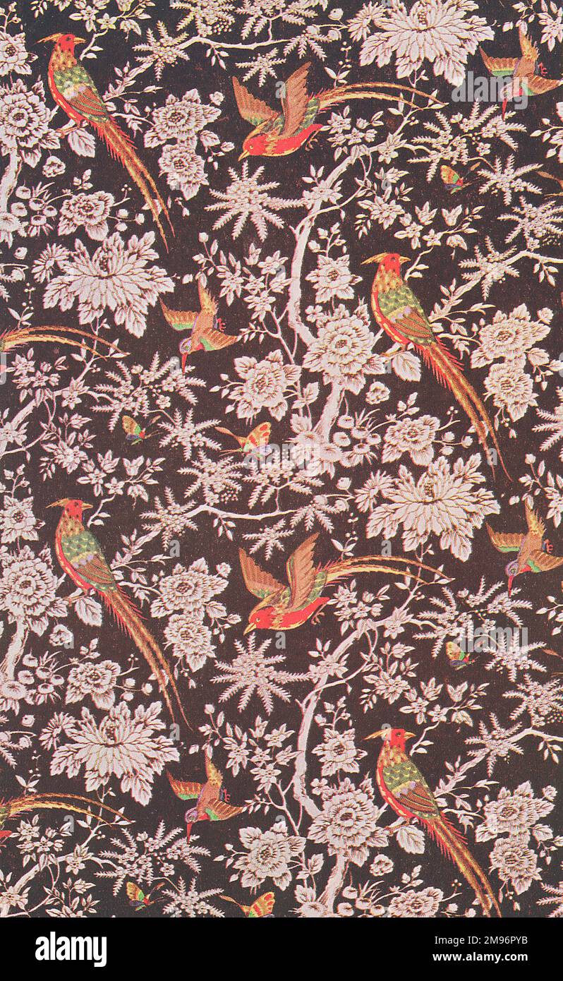 Fabric pattern depicting brightly coloured birds on branches Stock Photo