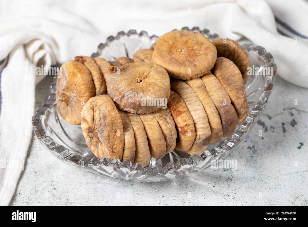 Dried figs on stone background. Sundried special string dried figs in