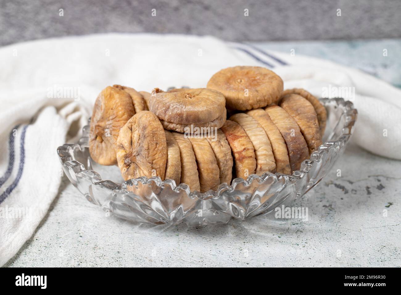 Dried figs on stone background. Sundried special string dried figs in