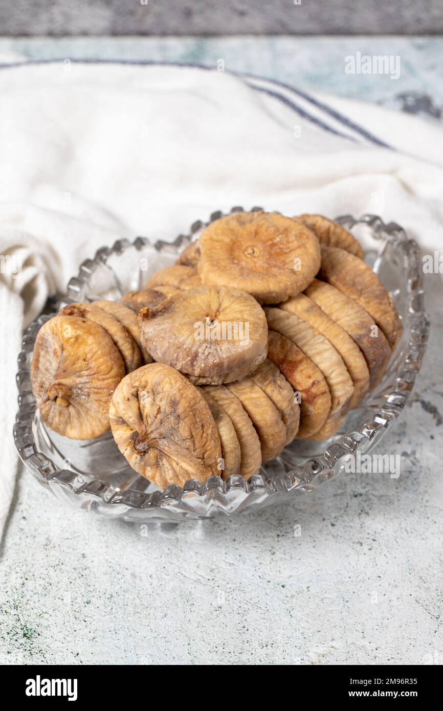 Dried figs on stone background. Sundried special string dried figs in