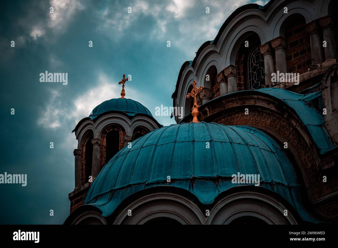 The crosses on the church domes against the background of the cloudy ...